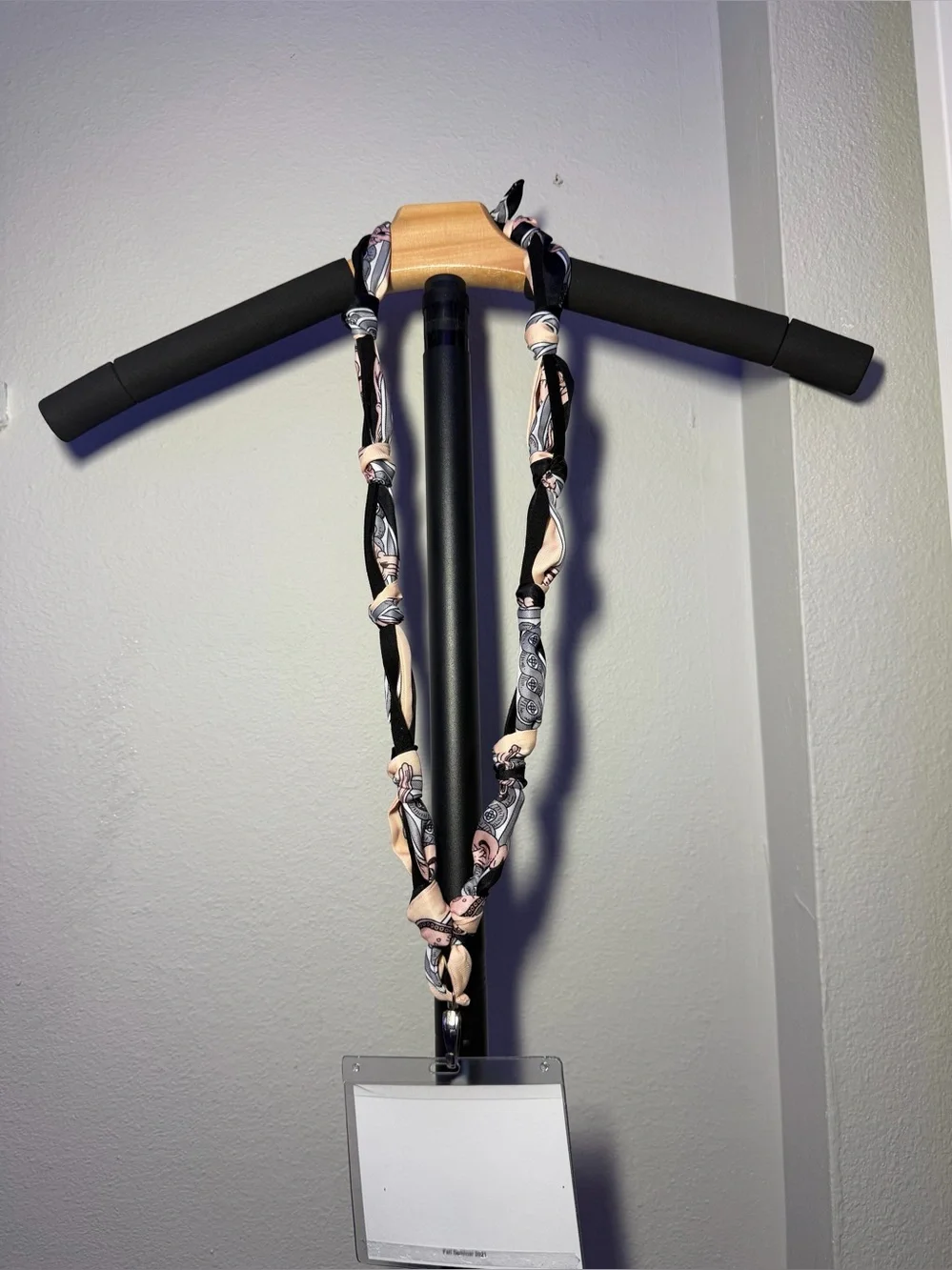 Silk-Twilly Pink and Black tied onto a leather lanyard holder/cell phone cord.